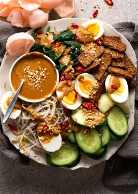  Gado-gado: Uma Sinfonia Aromática de Vegetais Frescos e um Molho de Amendoim Irresistível!